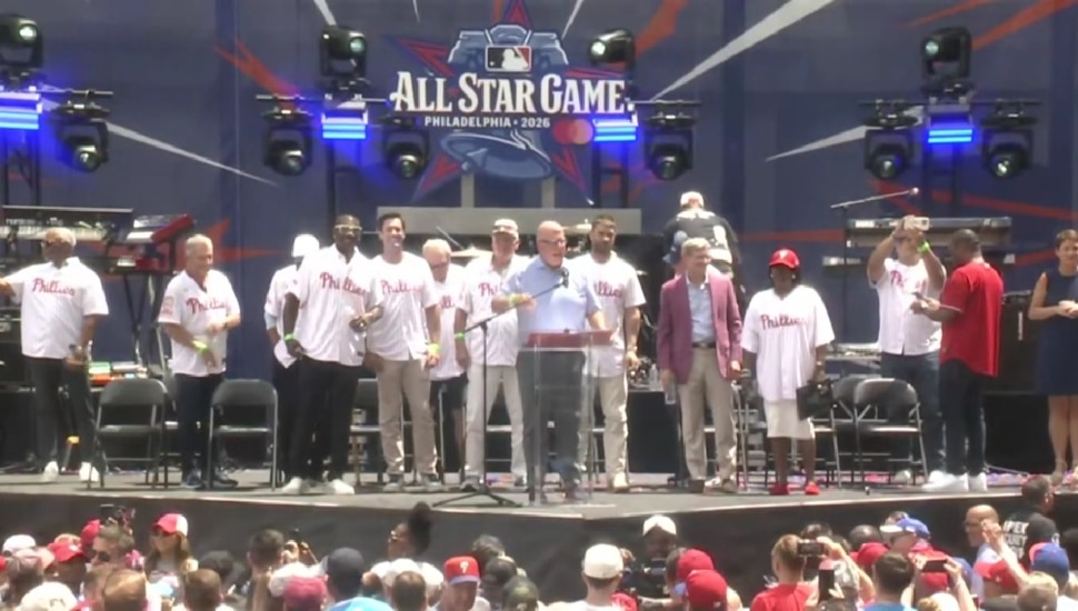 Philadelphia Phillies alumni, Tom McCarthy, Dan Baker, Mayor Cherelle Parker, and Council President Kenyatta Johnson on stage.