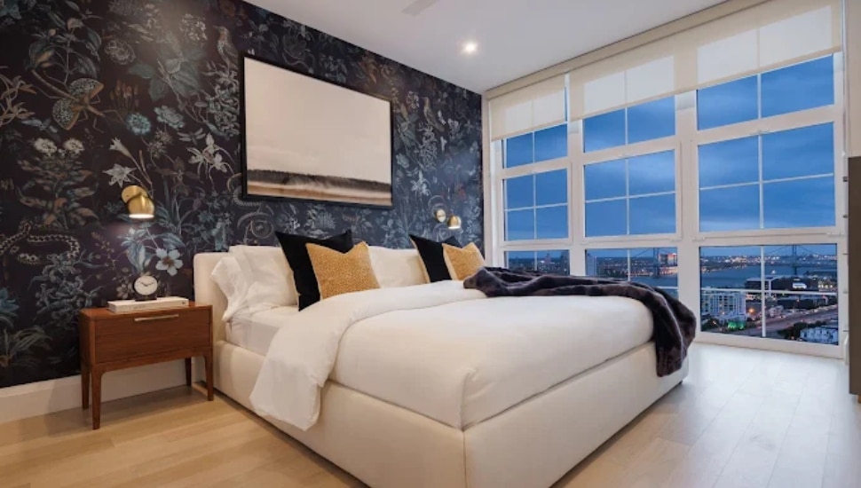 Piazza Alta bedroom with view of city.