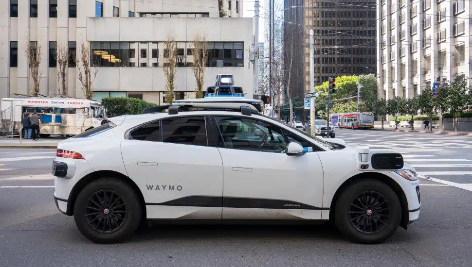 A Waymo car on the road.