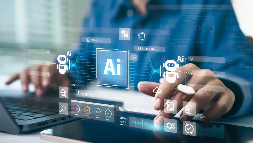 Man uses a laptop and AI assistant dashboard.