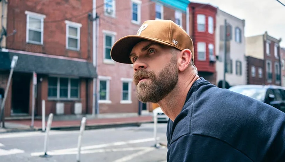 Bryce Harper looking to the right while wearing a new ’47 x Carhartt hat.