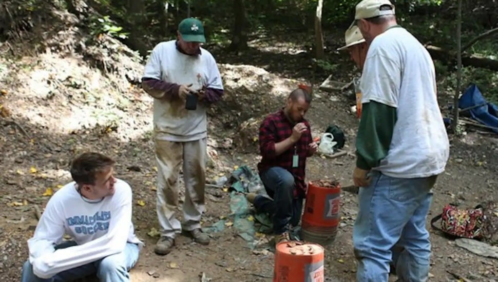 Several researchers at Duffy's Cut in Malvern.