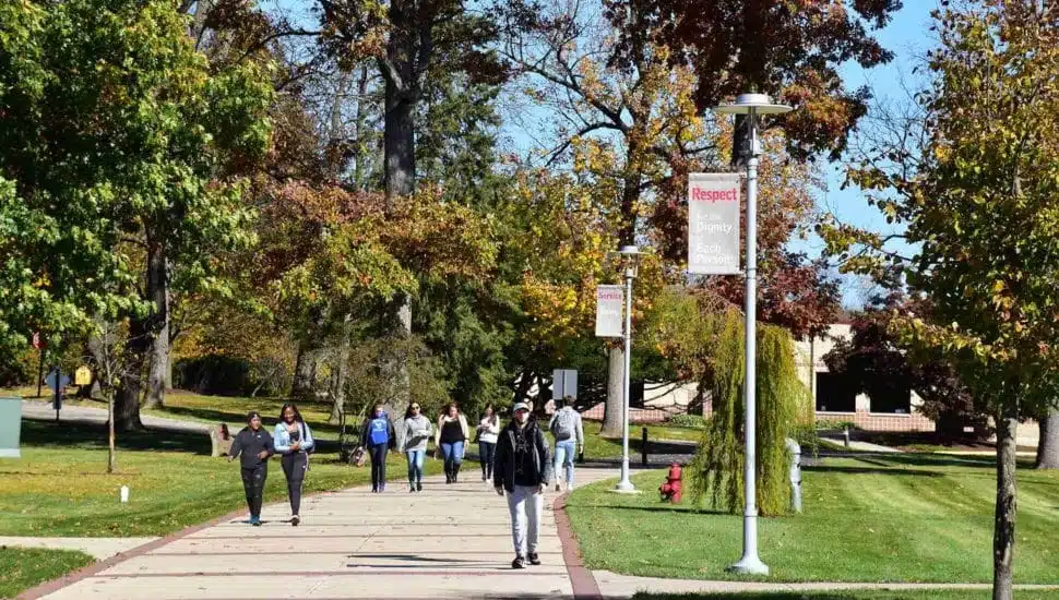 College students walk on campus.