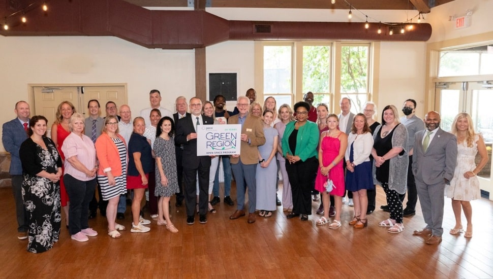 Group photo of nonprofit representatives at awards ceremony.