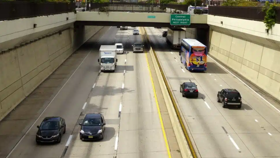 Cars driving on Vine Street.