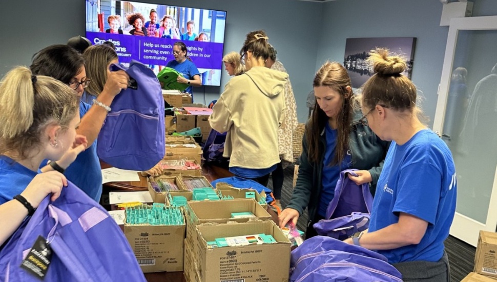 Workers at Cradles to Crayons.