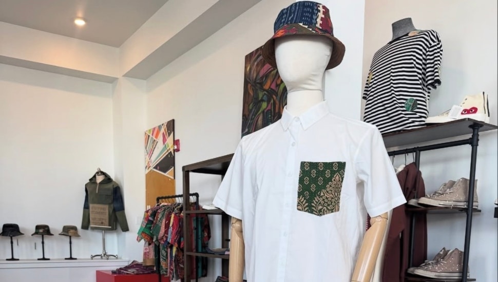Inside Holloman Handmade store with a mannequin and clothing in the background.