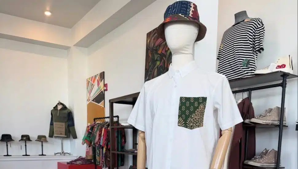 Inside Holloman Handmade store with a mannequin and clothing in the background.
