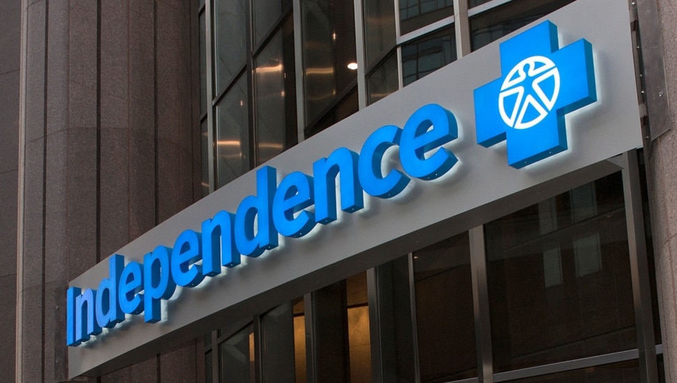 Health insurance company's blue signage on building.