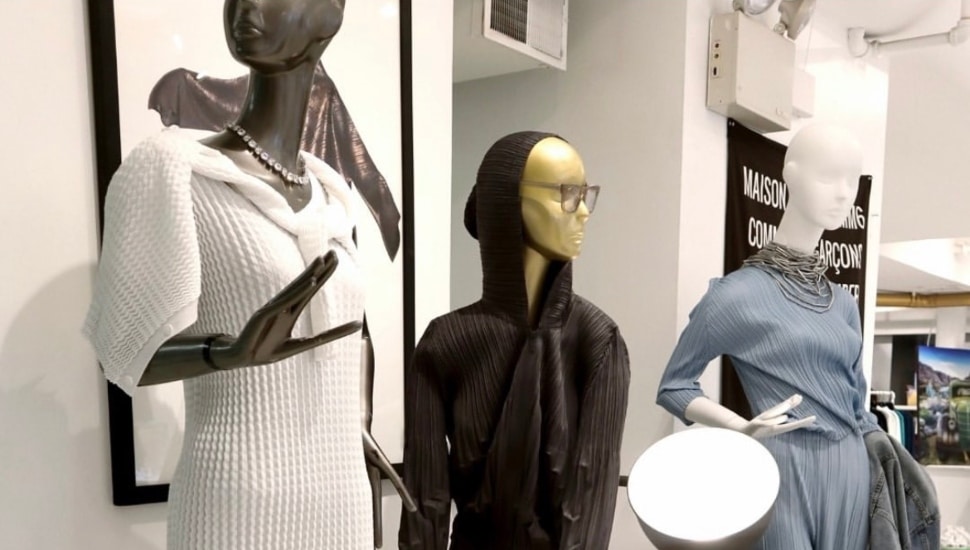 Three mannequins inside a Joan Shepp location.