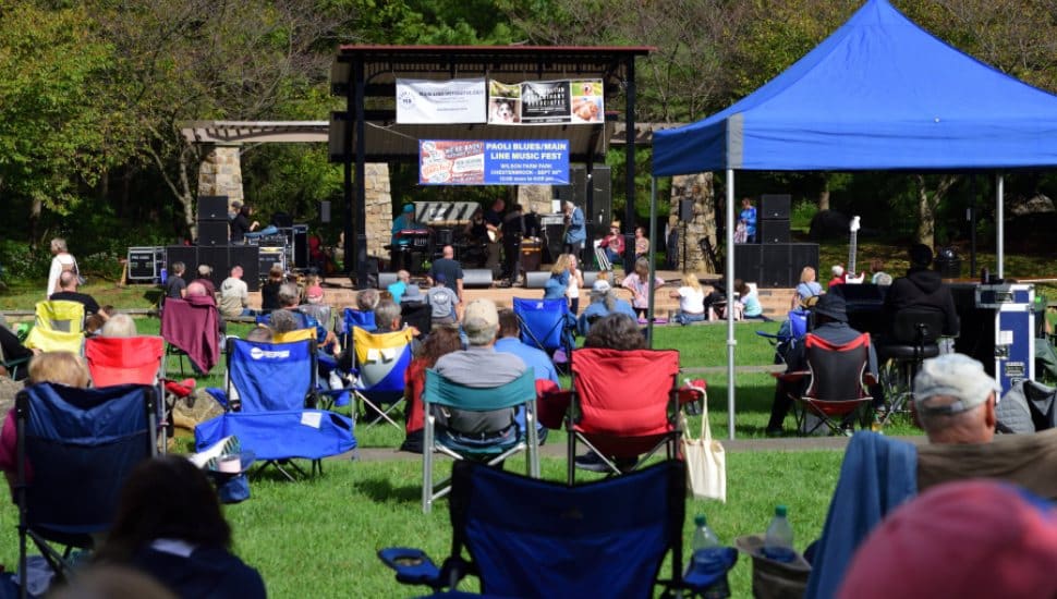 People enjoy an outside performance at the Main Line Music Festival.