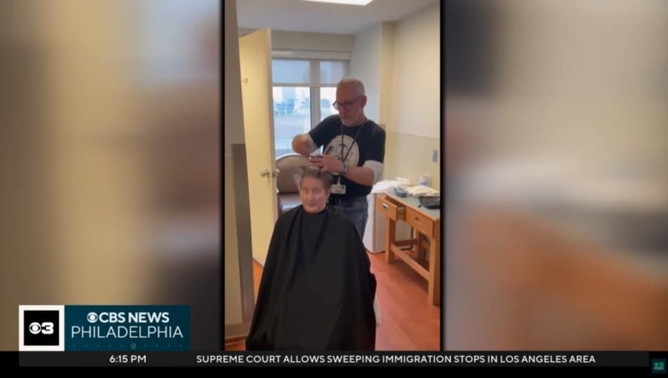 Richard Cornish performing a haircut on a Penn Medicine patient.