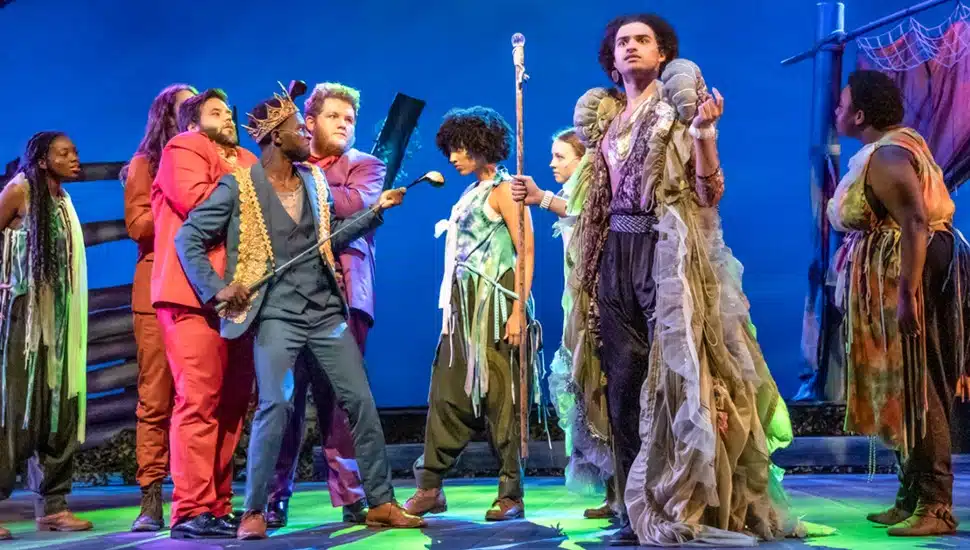 People on stage during a theatre production.
