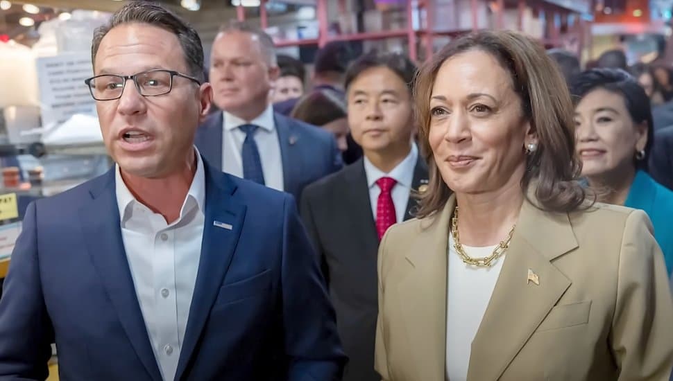 Josh Shapiro stands next to Kamala Harris.