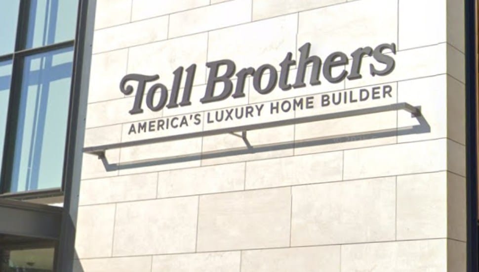 The Toll Brothers sign on the facade of their home office in Fort Washington.