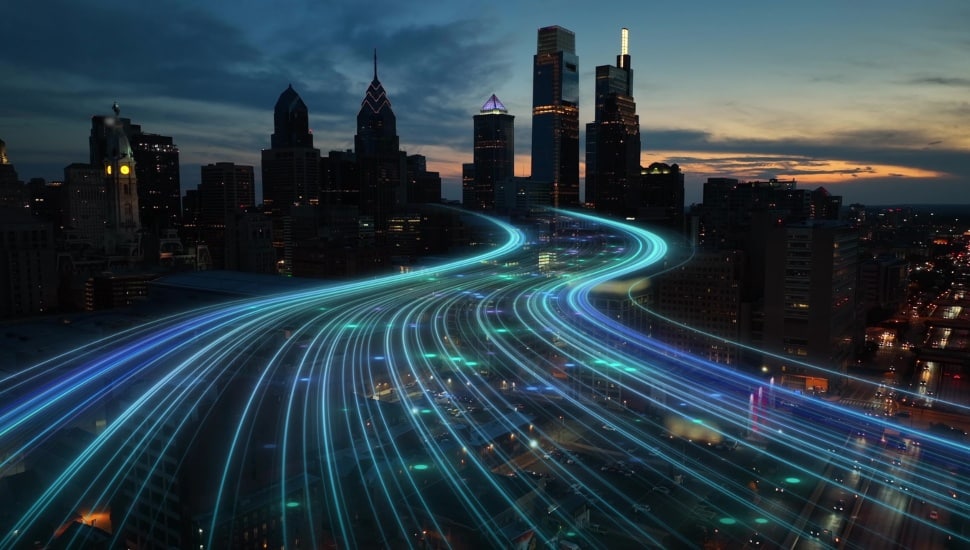 Smart city digital transformation development concept. Band lights over modern urban cityscape at night.