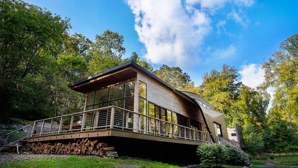 Copper House exterior surrounded by trees.