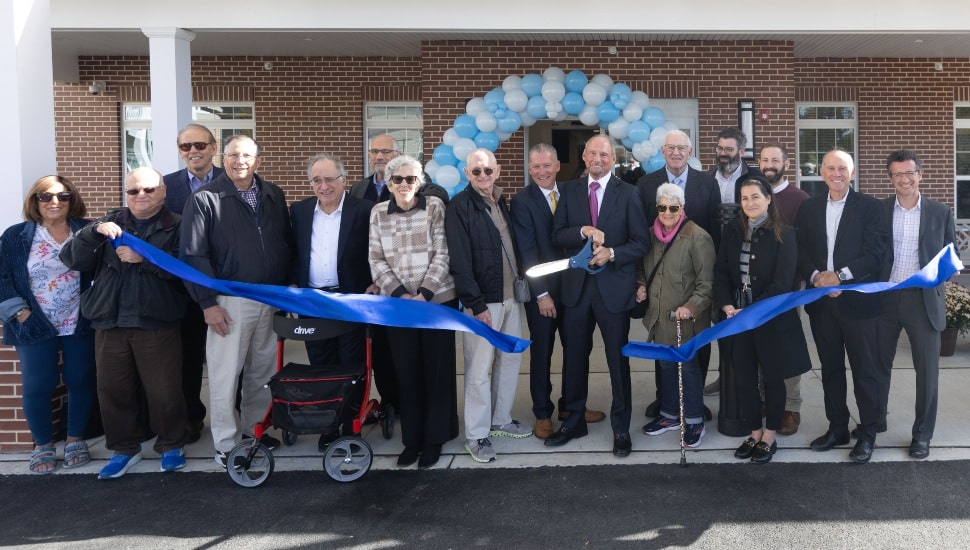 Ribbon cutting at a new senior living community.