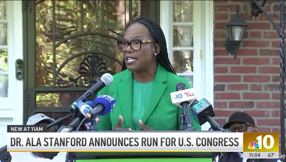 Dr. Ala Stanford at the podium announcing her Congressional bid.
