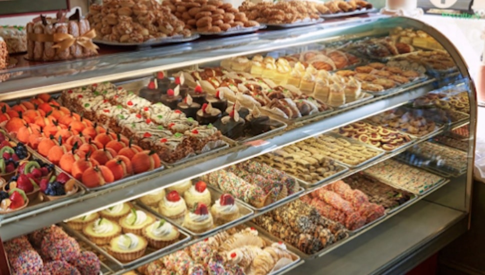 A window of many sweets inside Isgro Pastries.