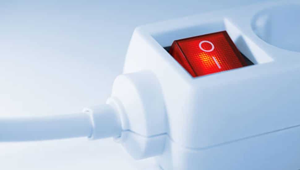 Power cord with red button.