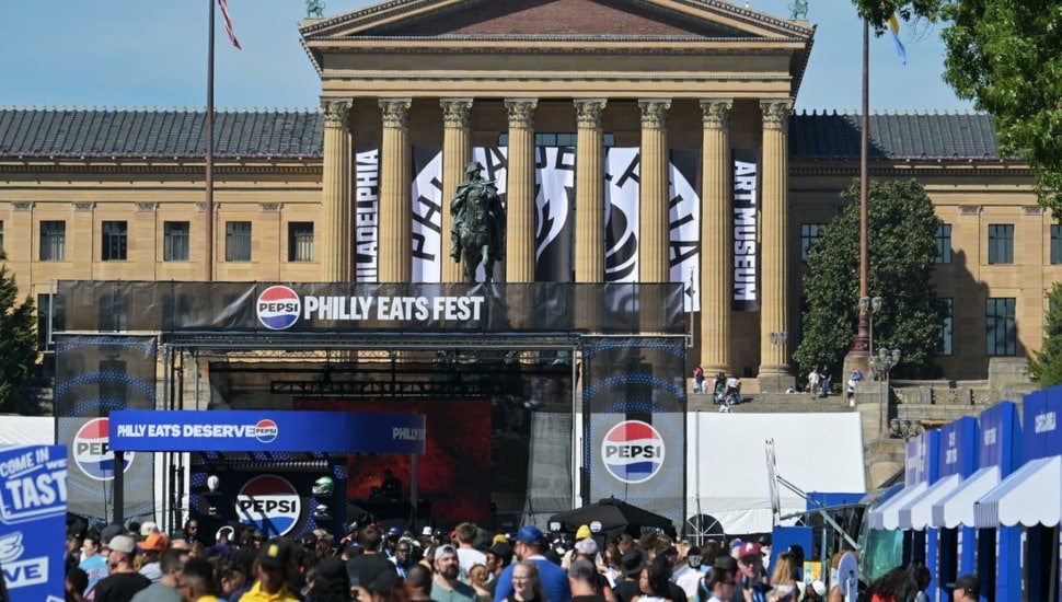 People at the Pepsi Philly Eats Fest, with the Philadelphia Museum of Art in the background.
