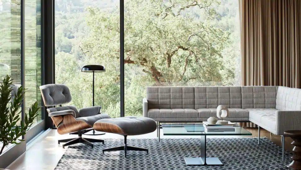 A couch, arm chairs, a lamp, and coffee table.