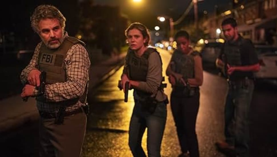 Tom Brandis (Mark Ruffalo) hugs his family after his son Ethan (Andrew Russel)'s parole hearing in the "Task" finale.