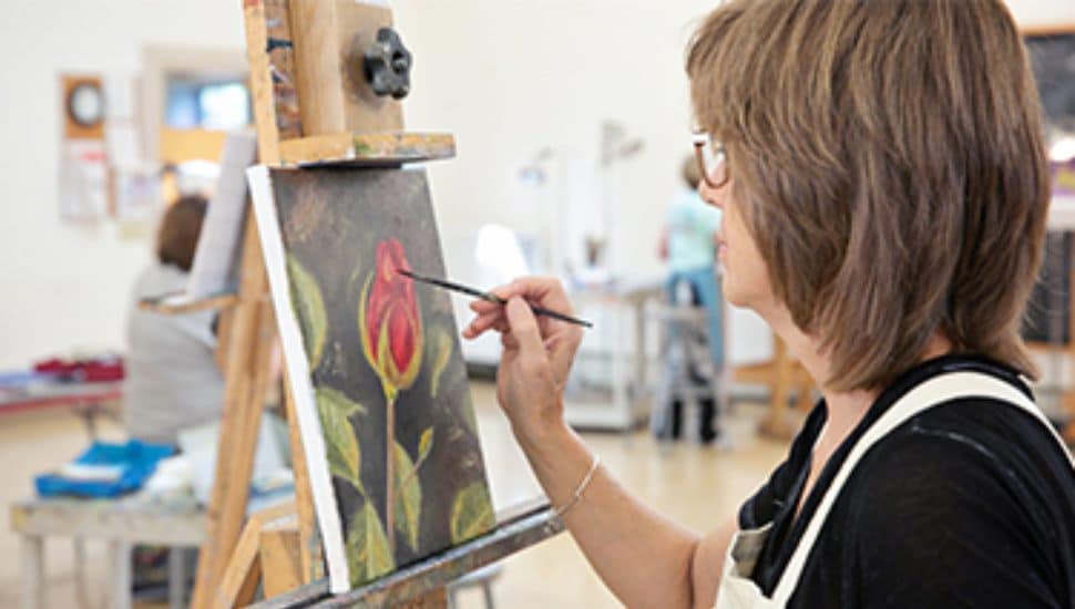 A painting student at the Wayne Art Center.
