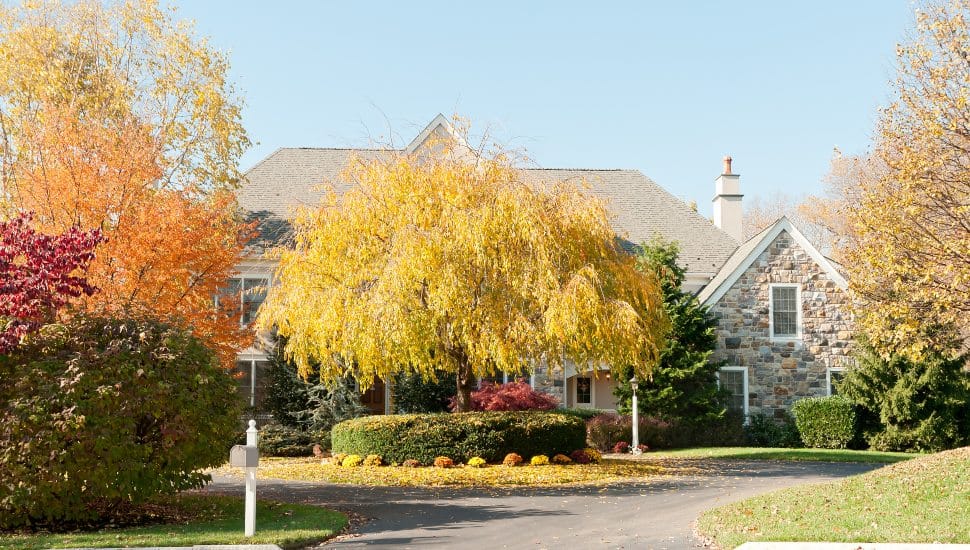 Upscale family house with autumn trees in Philadelphia.