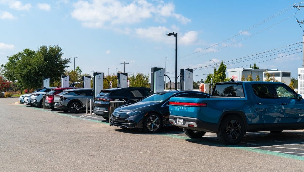 Cars parked at EV chargers.