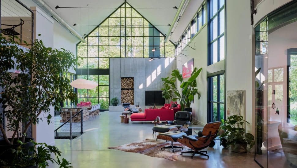 Living room with floor to ceiling windows.