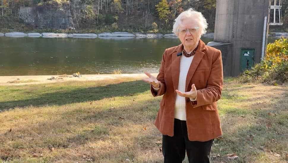 Meg McGuire speaking by the Delaware River.