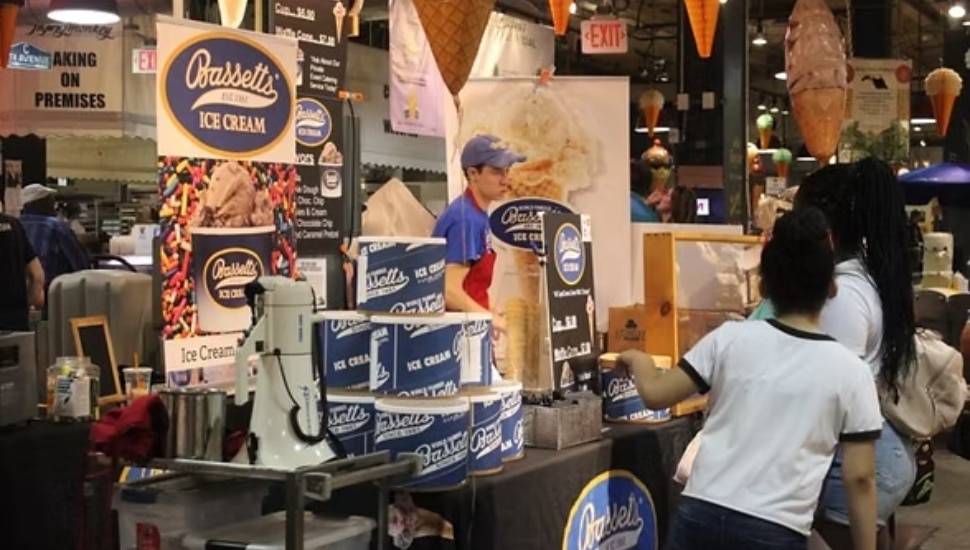 Customers and workers Bassetts Ice Cream in Reading Terminal Market.