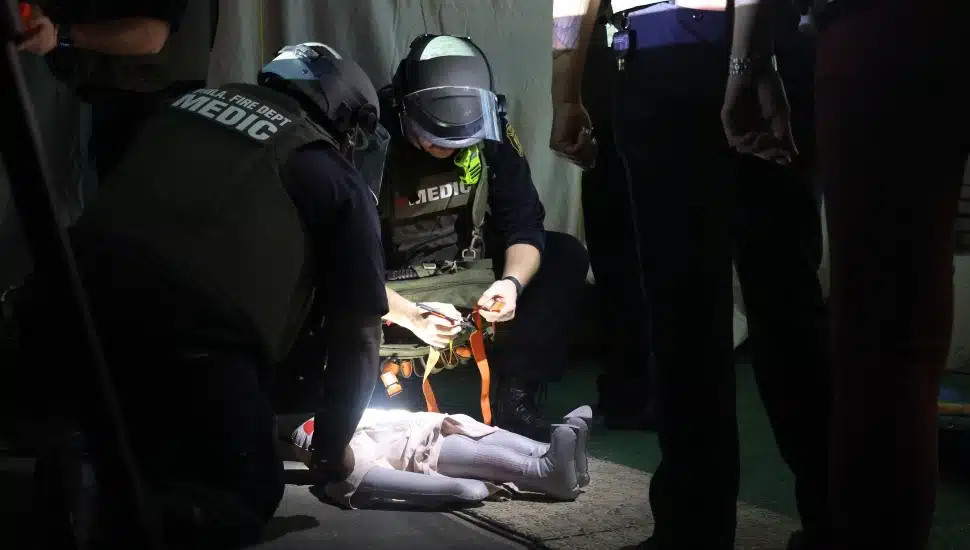 Medics working on a dummy.