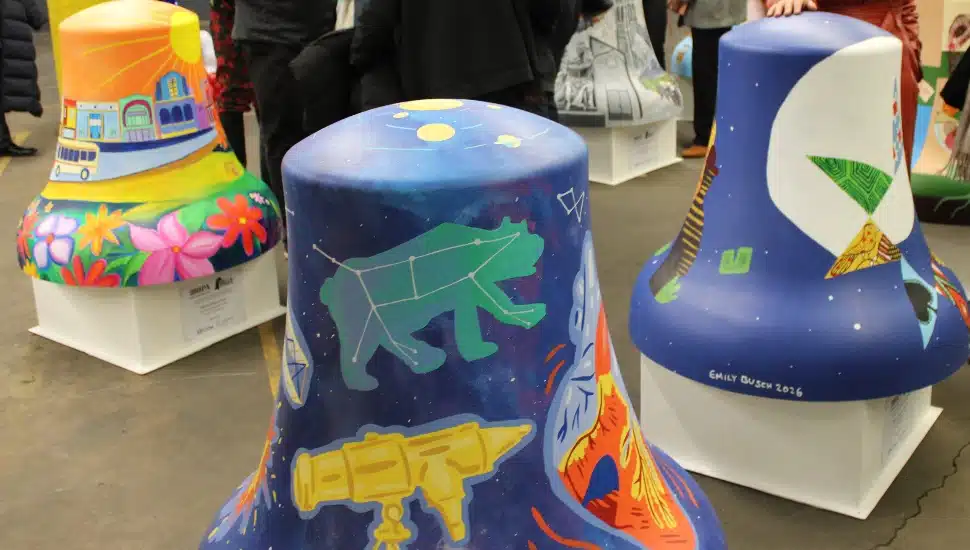 Three colorful and unique Liberty Bell replicas.