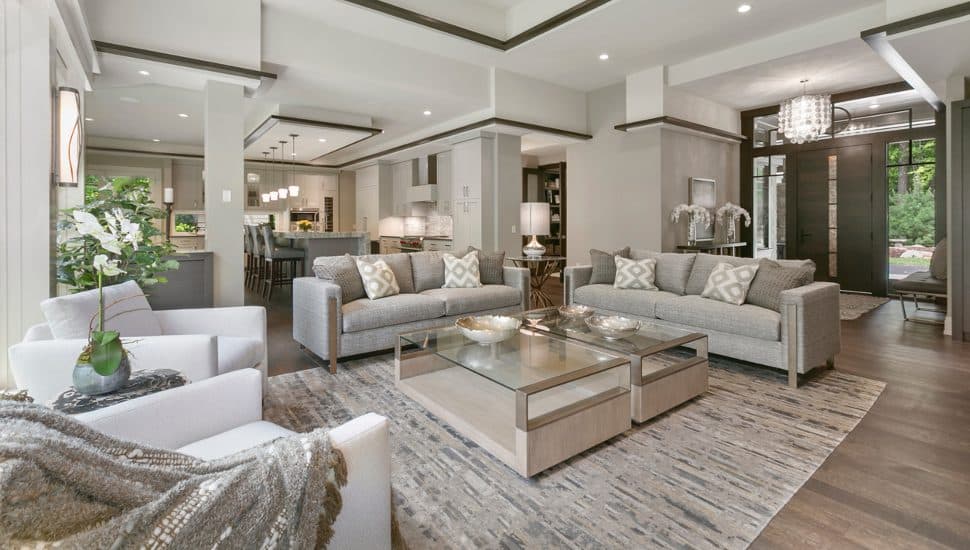 Modern furniture and decor in an open concept floor plan.