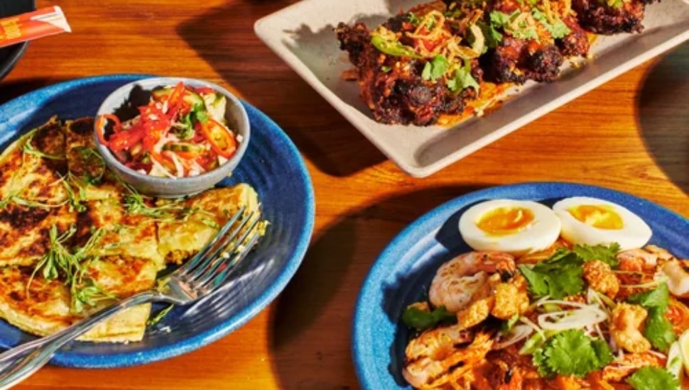 Plates of food from Pig & Khao.