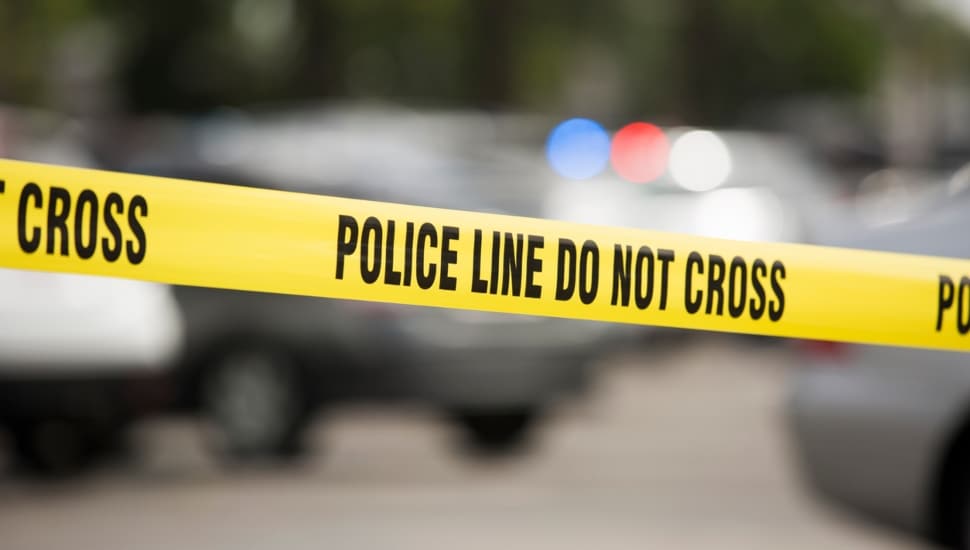 Caution tape at a crime scene.