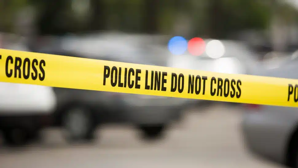Caution tape at a crime scene.