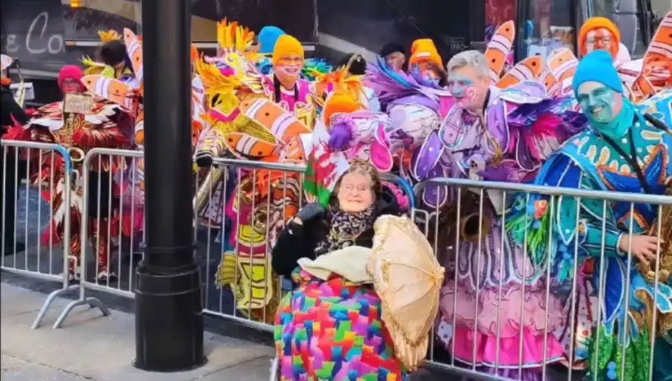 Avril Davidge in her wheelchair enjoying the presence of the Mummers.