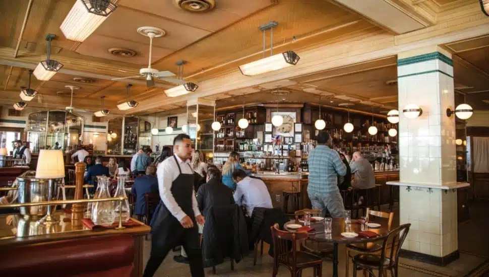 Workers and diners inside Parc restaurant in Rittenhouse Square