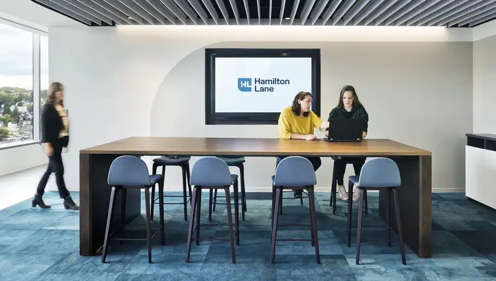 Employees inside Hamilton Lane office.