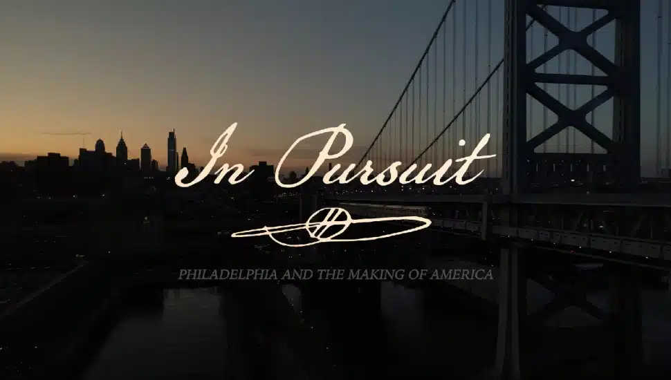 "In Pursuit: Philadelphia and the Making of America" written with shot of the Ben Franklin Bridge in the background.