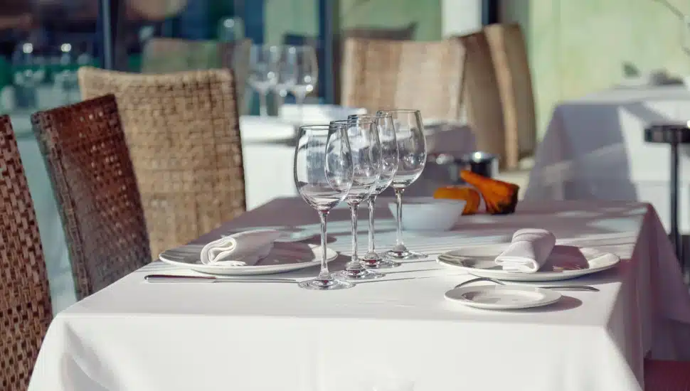 Served table in restaurant interior.