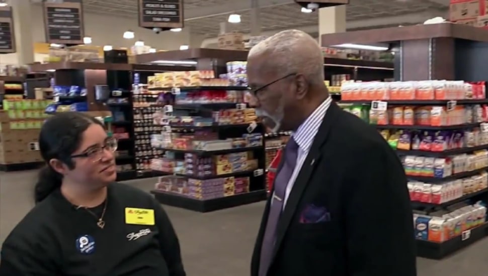 Joan Vargas and Jeremiah Cousins at an aisle in ShopRite.