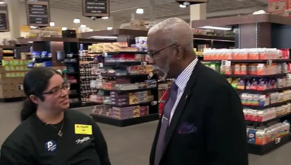 Joan Vargas and Jeremiah Cousins at an aisle in ShopRite.