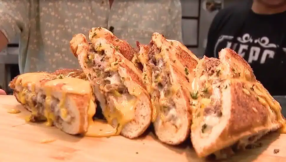 Four pizzadillas made with grande mozzarella, chopped ribeye, banana peppers, caramelized onions, and Whiz.