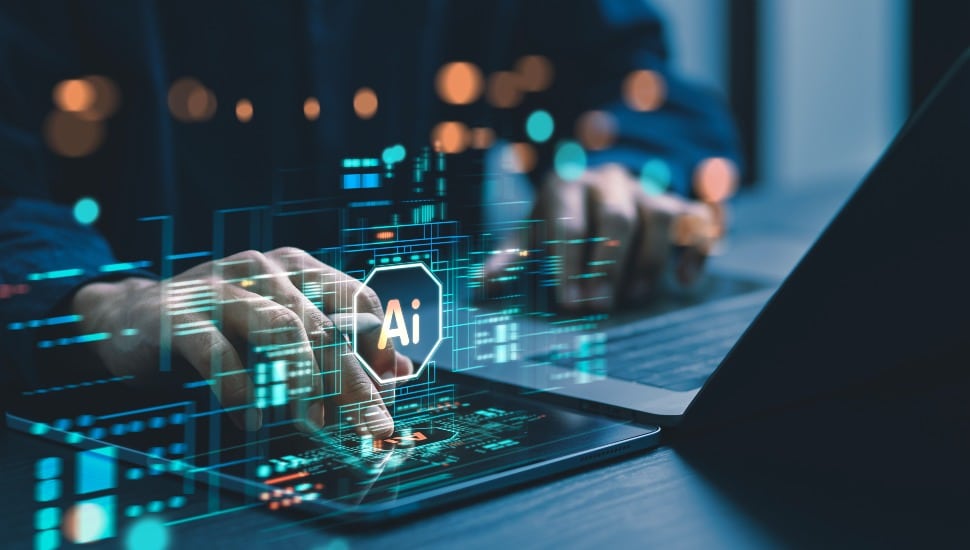 A man works from a laptop with an overlay of AI images.