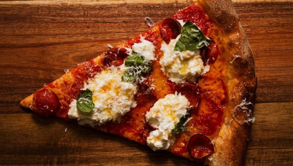 A single slice of pizza.